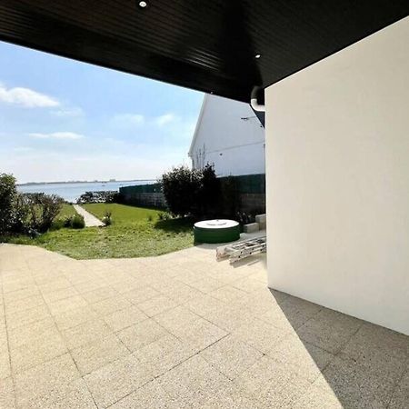 Maison de charme vue mer 180 rénovée Accès plage Riantec Extérieur photo